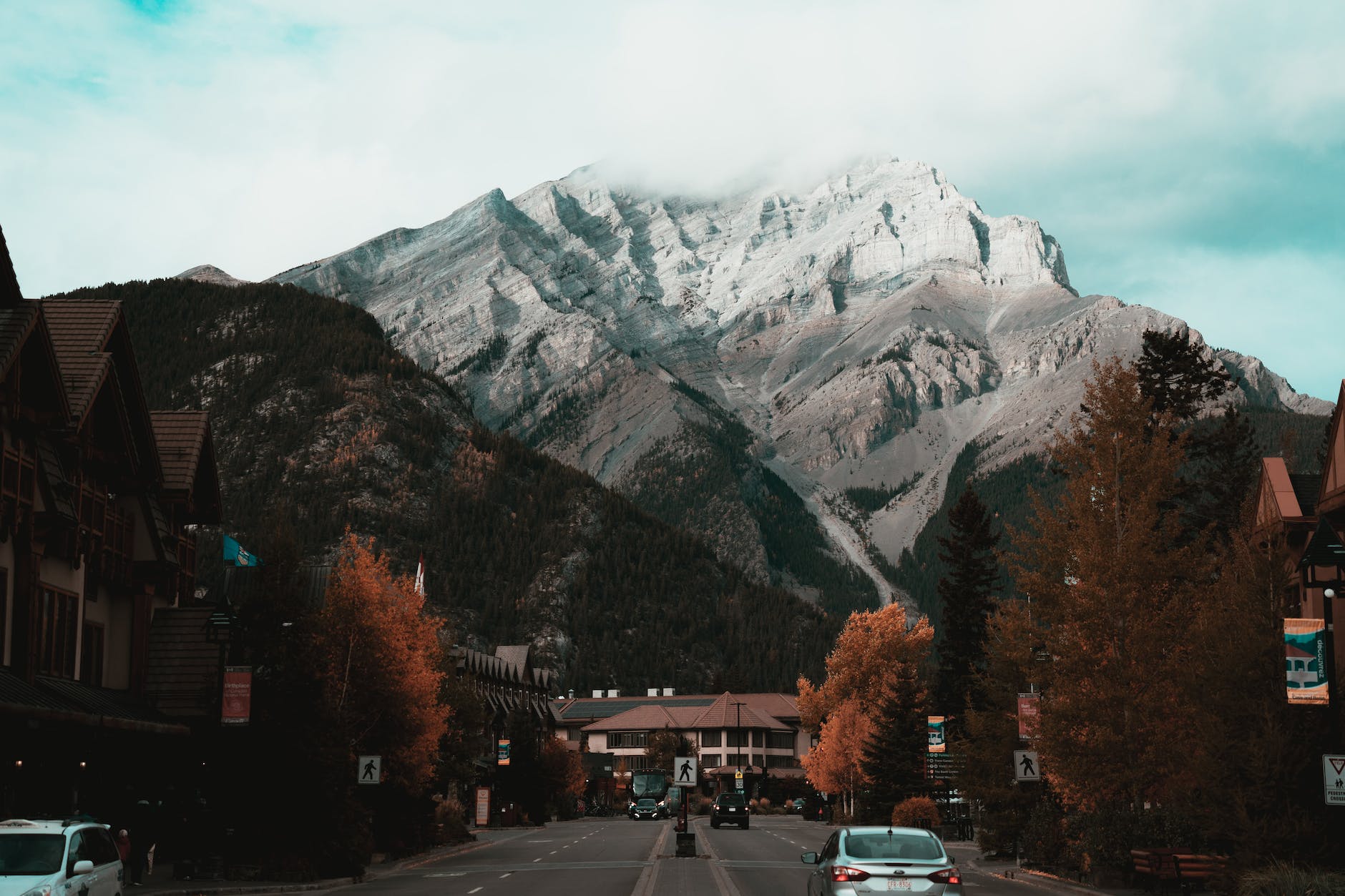 scenic view of the snowy mountain near a town