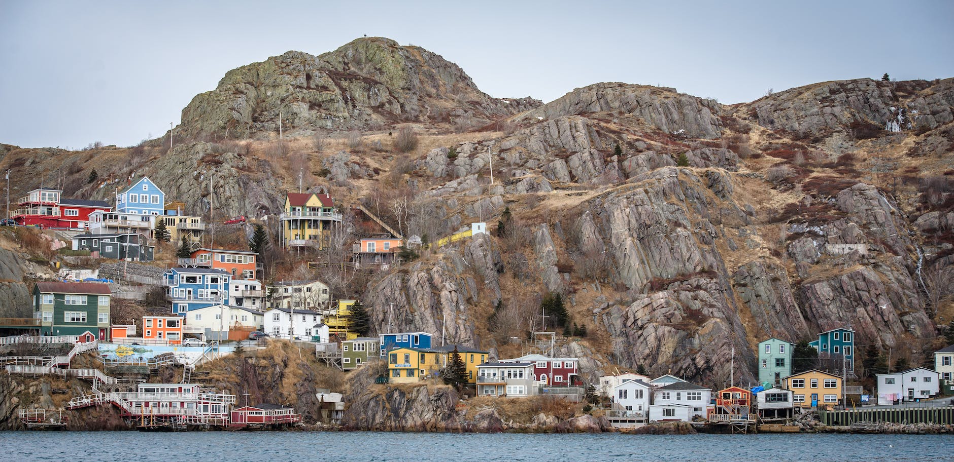 assorted color buildings near body of water